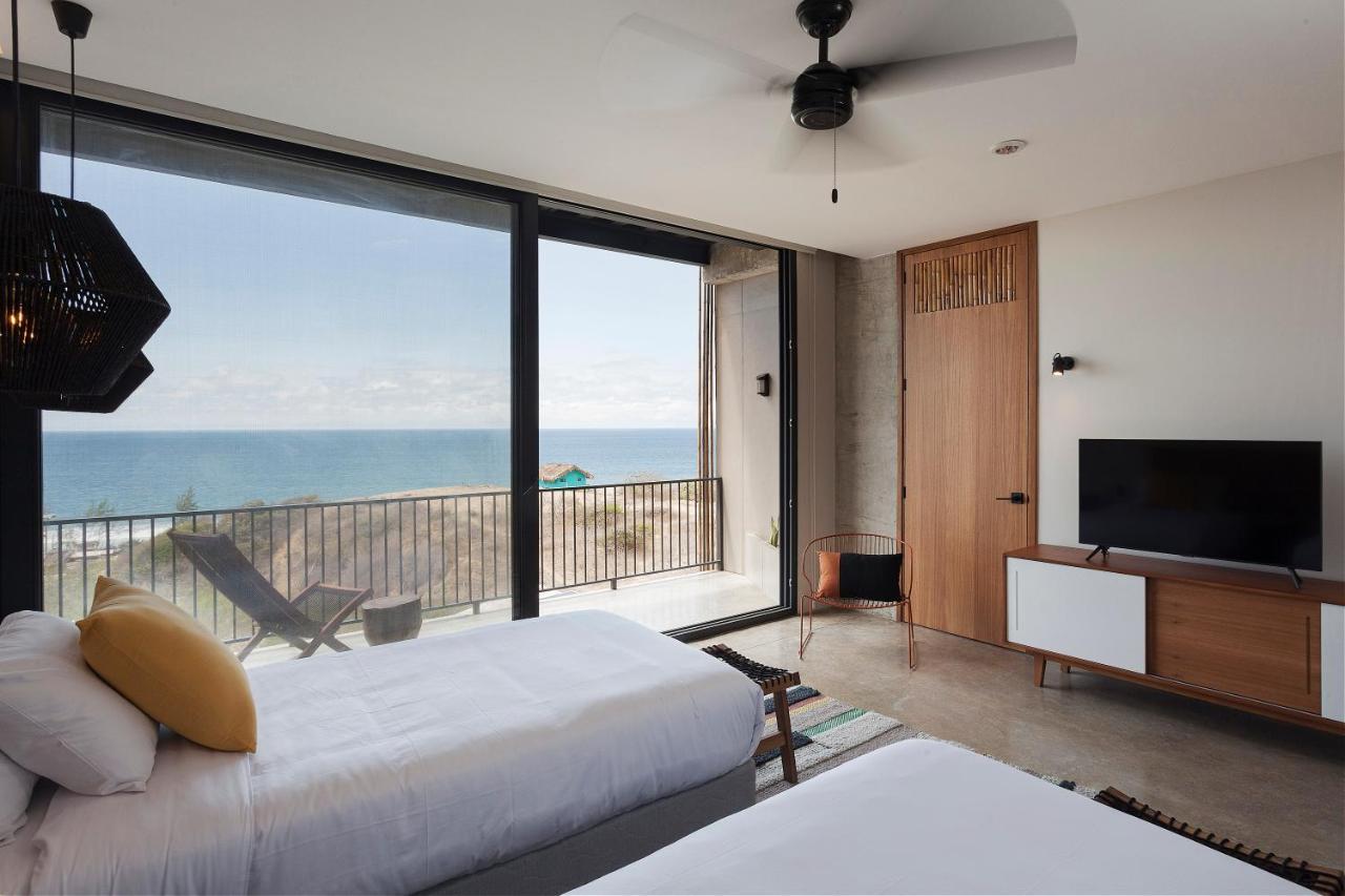 Eolia Sustainable Design Hotel Manta Extérieur photo